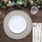 Matte gray hammered charger plate on a wooden table setting.