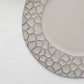 Matte gray hammered charger plate with modern flat design, 13 inches.