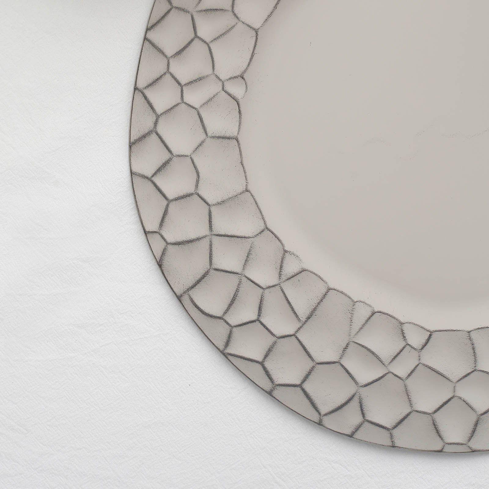 Matte gray hammered charger plate with modern flat design, 13 inches.