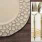 Matte finish taupe hammered charger plate with flat modern design.