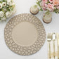 Taupe hammered charger plate on a table setting with flowers and candles.