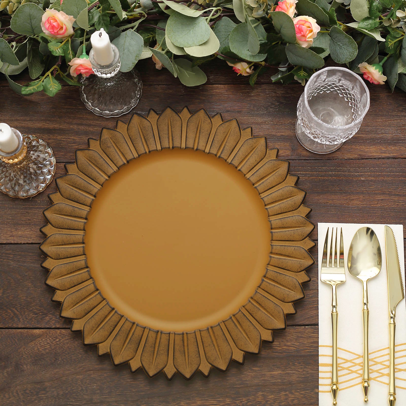 Matte mustard yellow sunflower charger plate on a rustic table setting.