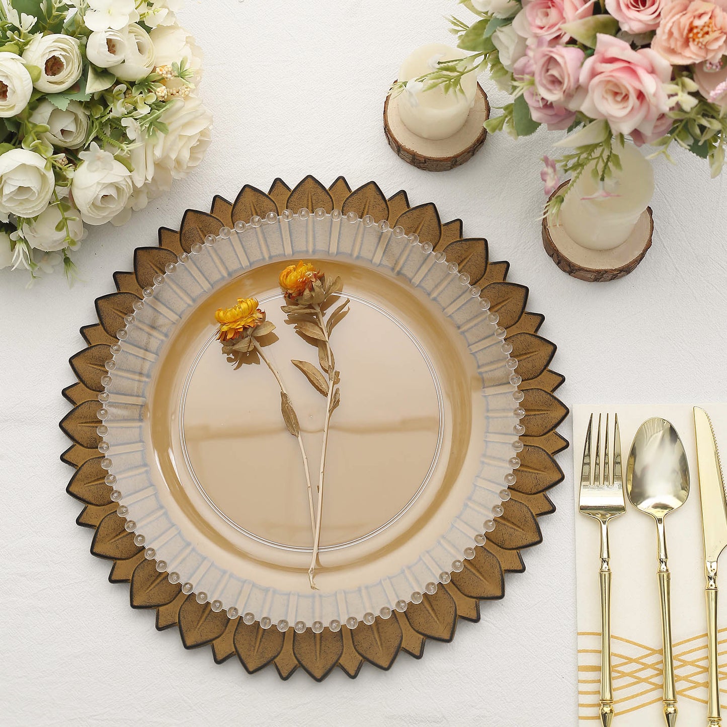 Matte mustard yellow sunflower disposable charger plates on a table setting.