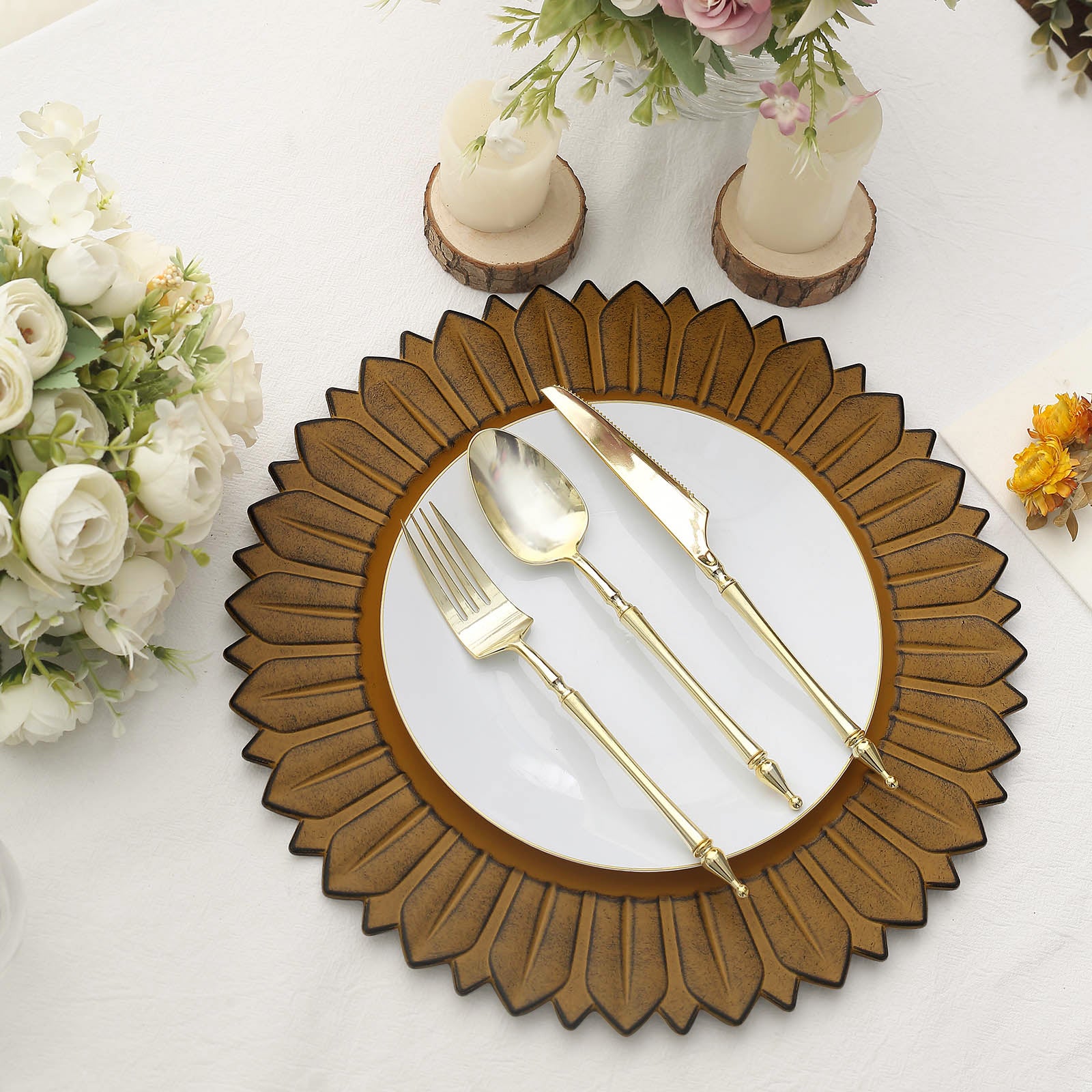 Matte mustard yellow sunflower charger plate with elegant cutlery.