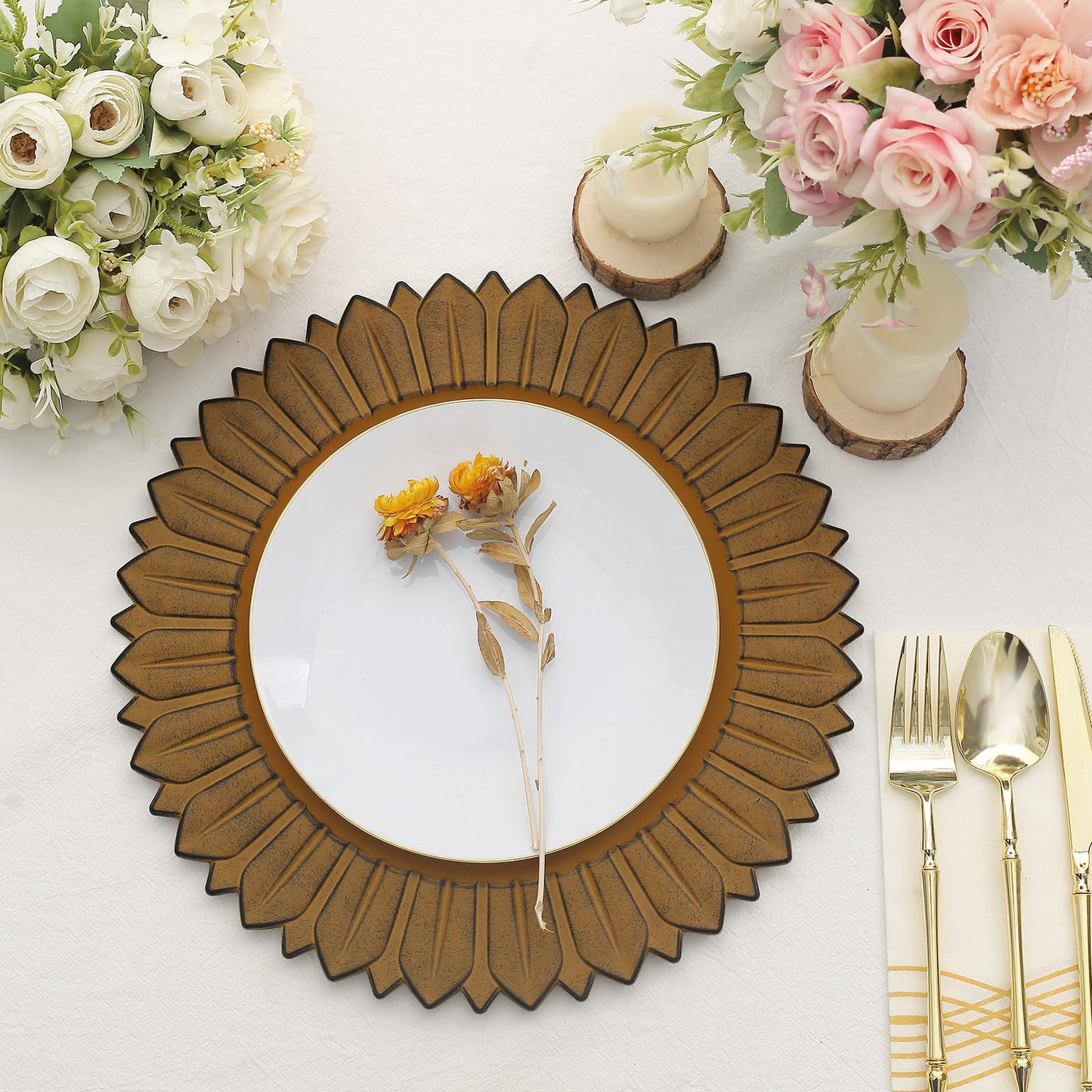 Matte mustard yellow sunflower disposable charger plates on a table setting.