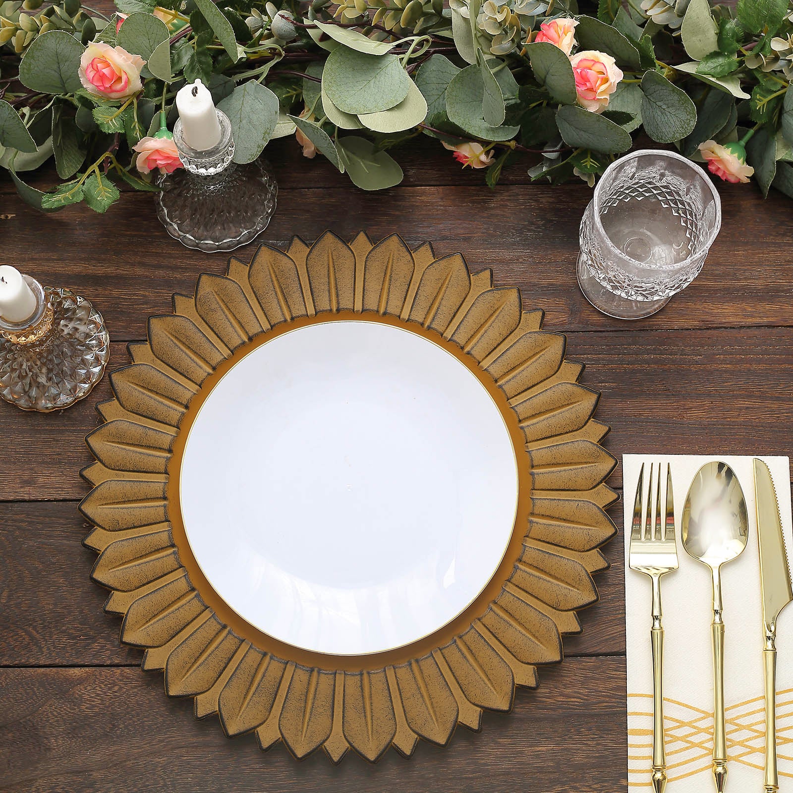 Matte mustard yellow sunflower disposable charger plate on a table setting.
