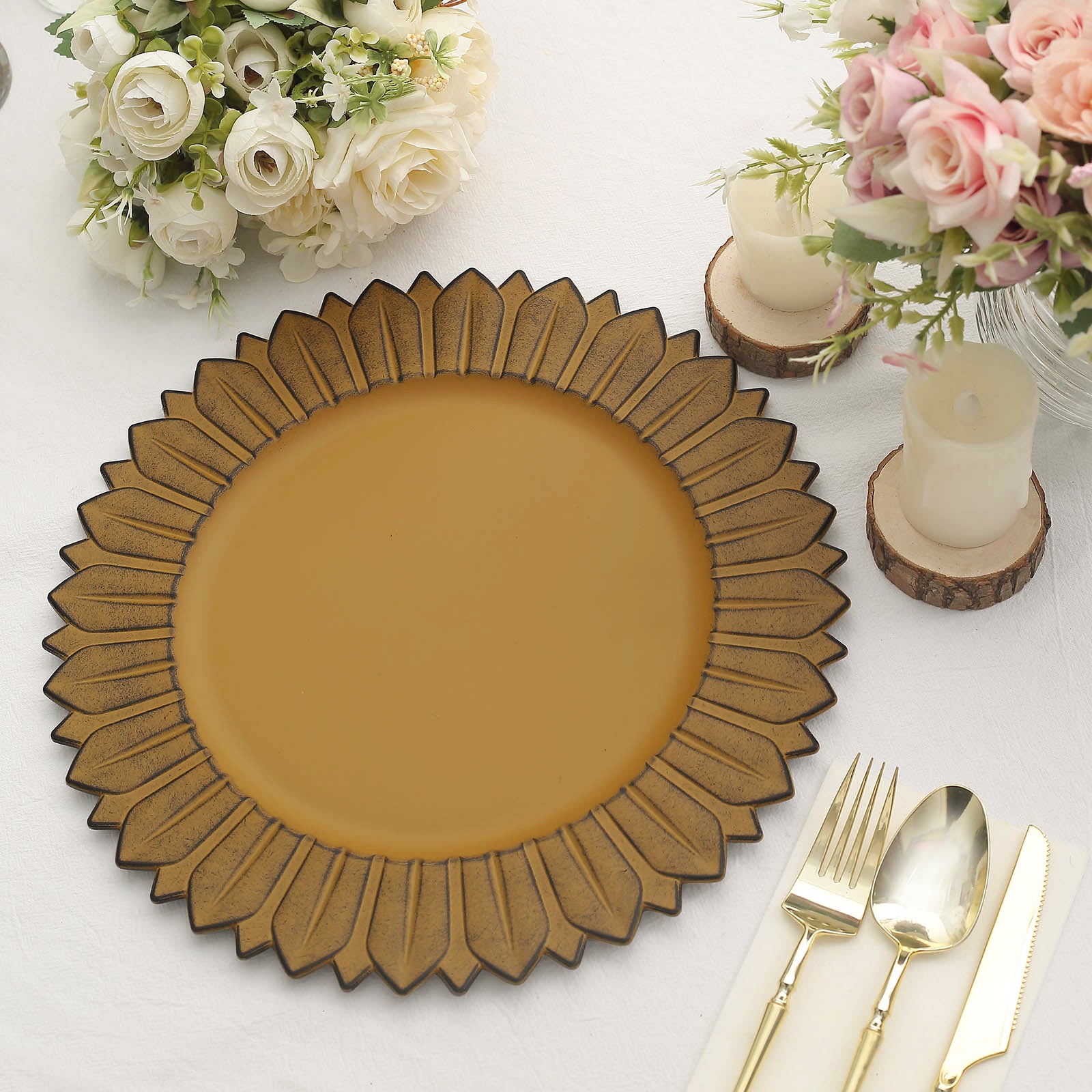 Matte mustard yellow sunflower disposable charger plate on a table setting.