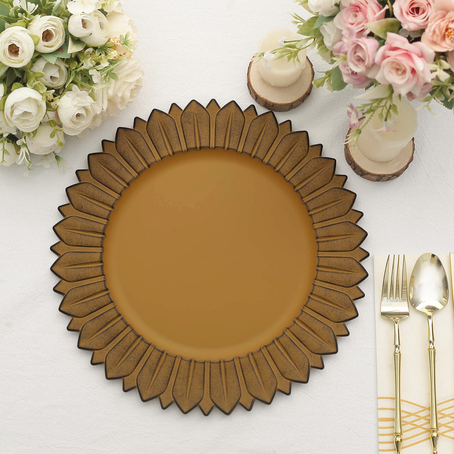 Matte mustard yellow sunflower charger plate on a table setting.