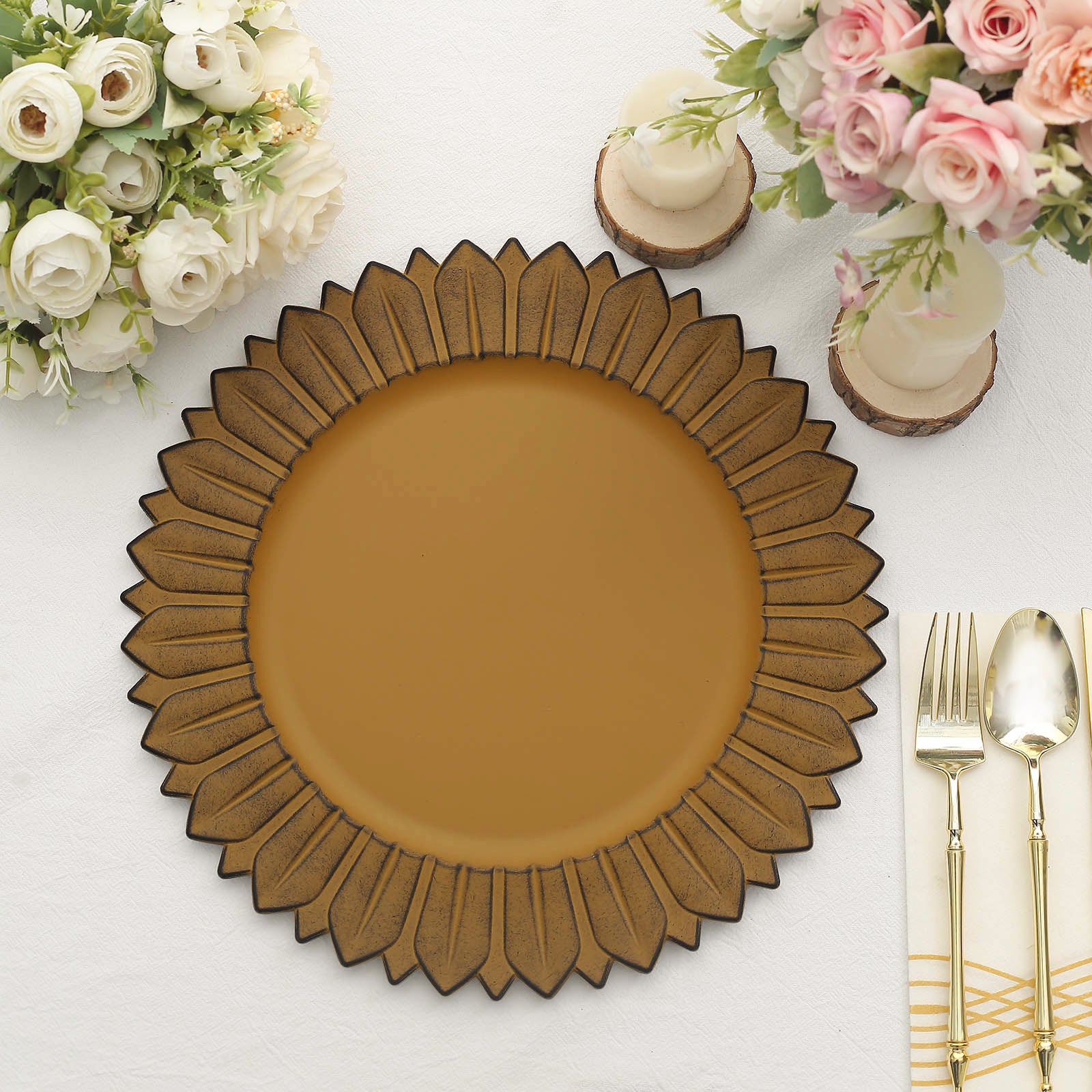 Matte mustard yellow sunflower charger plate on a table setting.