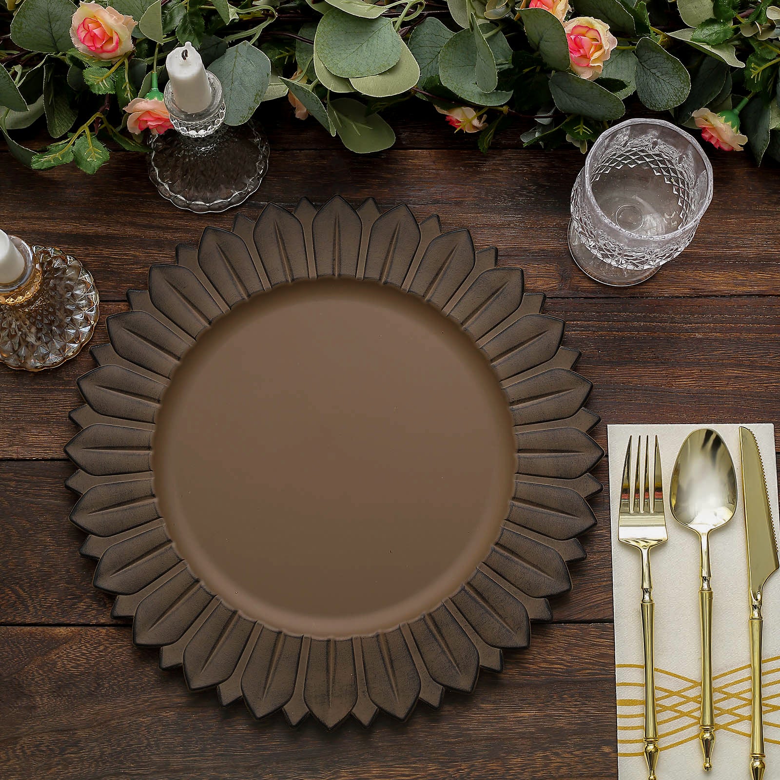 Matte natural sunflower disposable charger plate on a wooden table.