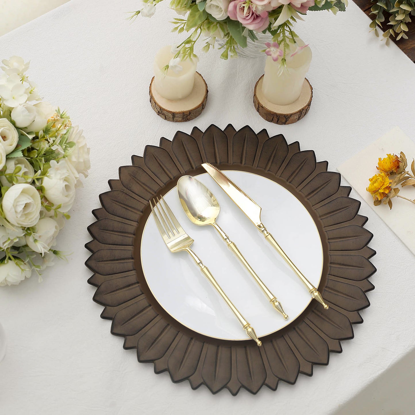 Matte natural sunflower charger plate with elegant gold utensils.