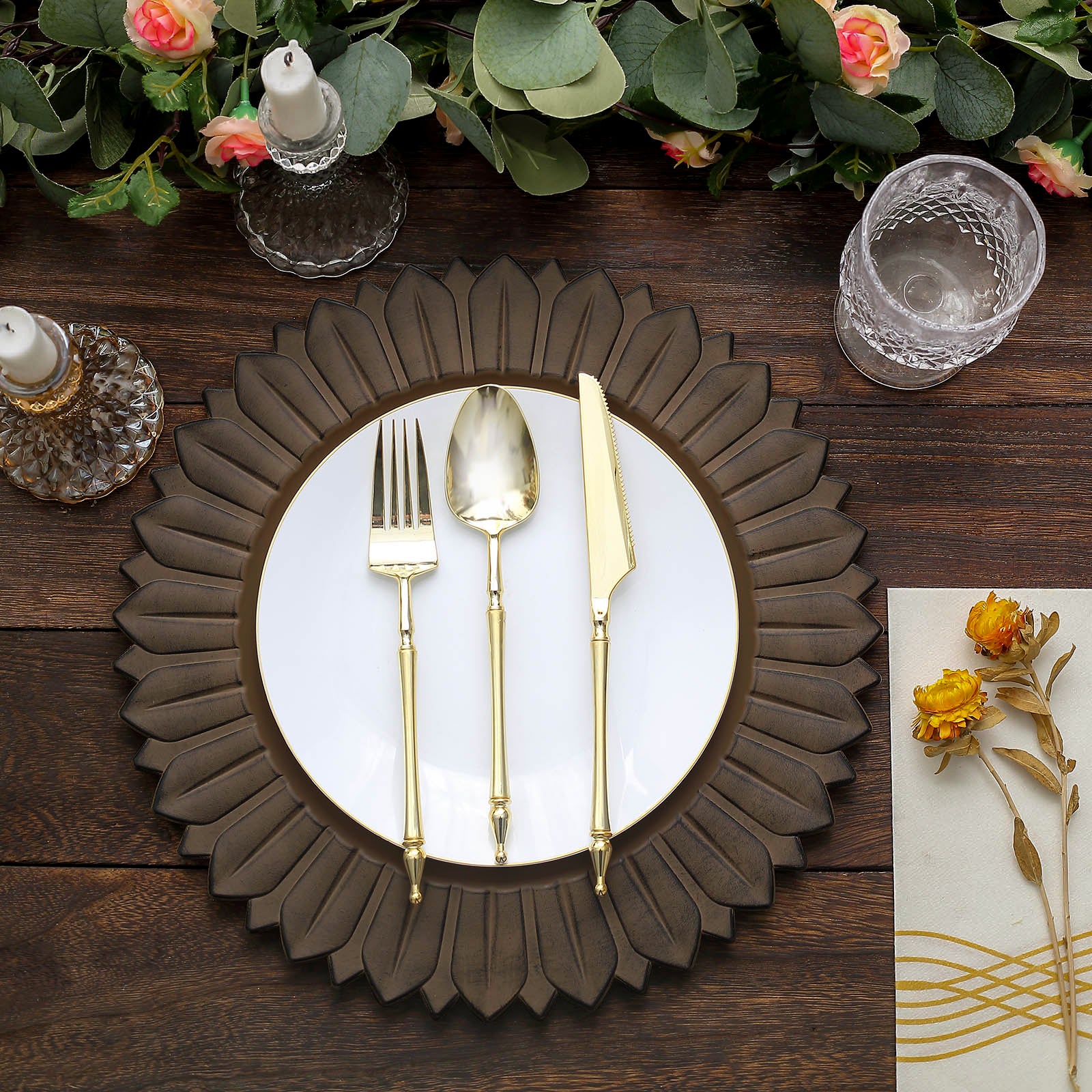 Matte natural sunflower charger plate with elegant dining utensils.
