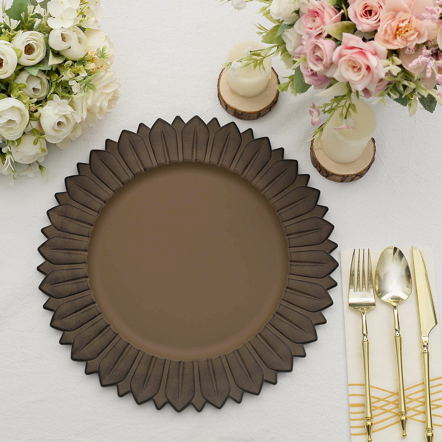 Matte natural sunflower disposable charger plate on a table setting.