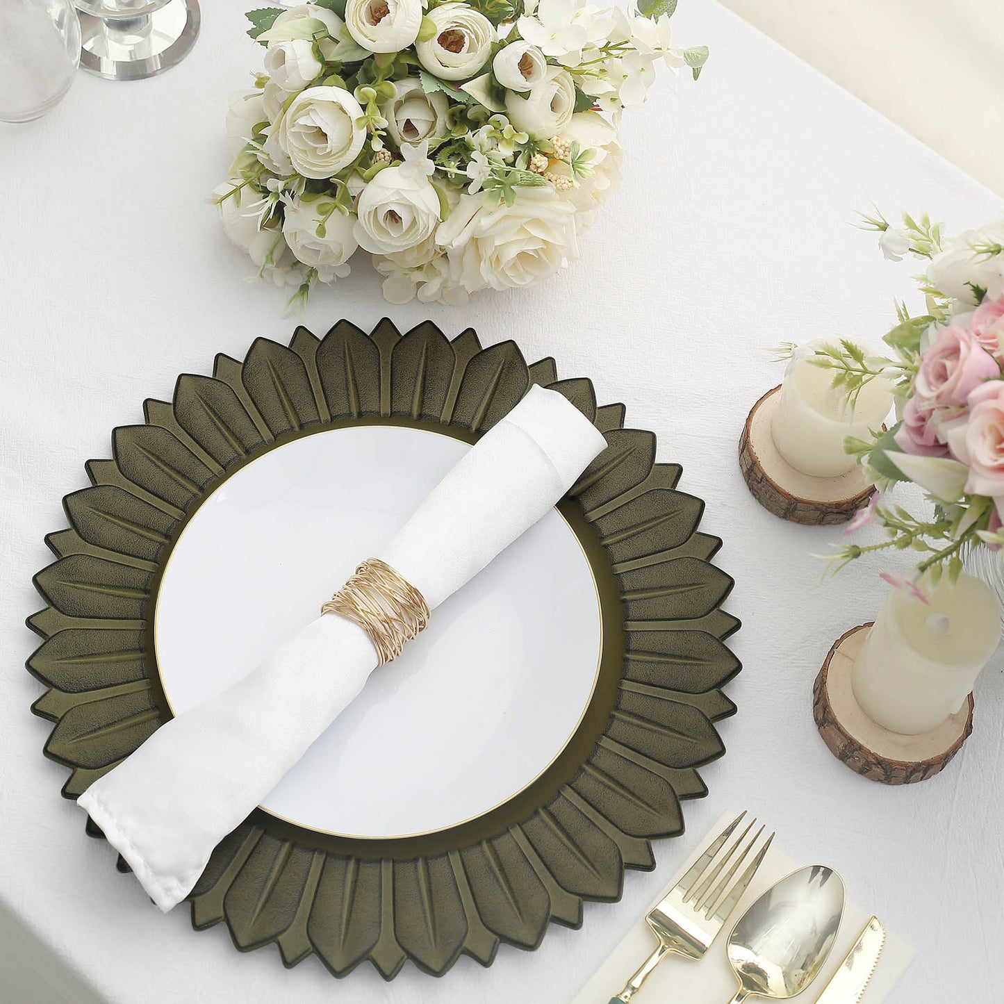 Matte olive green sunflower charger plate on a table setting.