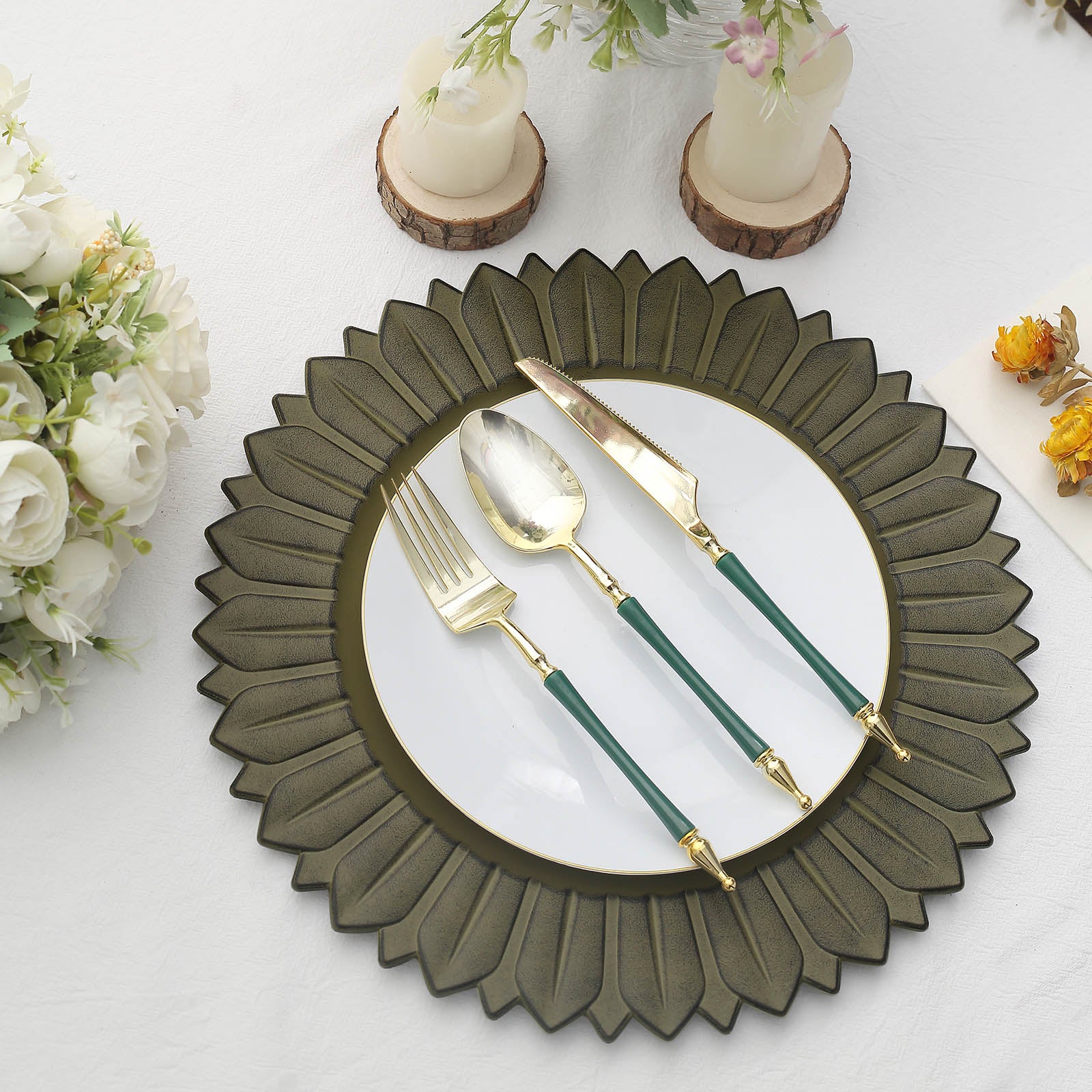 13" Matte Olive Green Sunflower Disposable Charger Plate with utensils on a table setting.