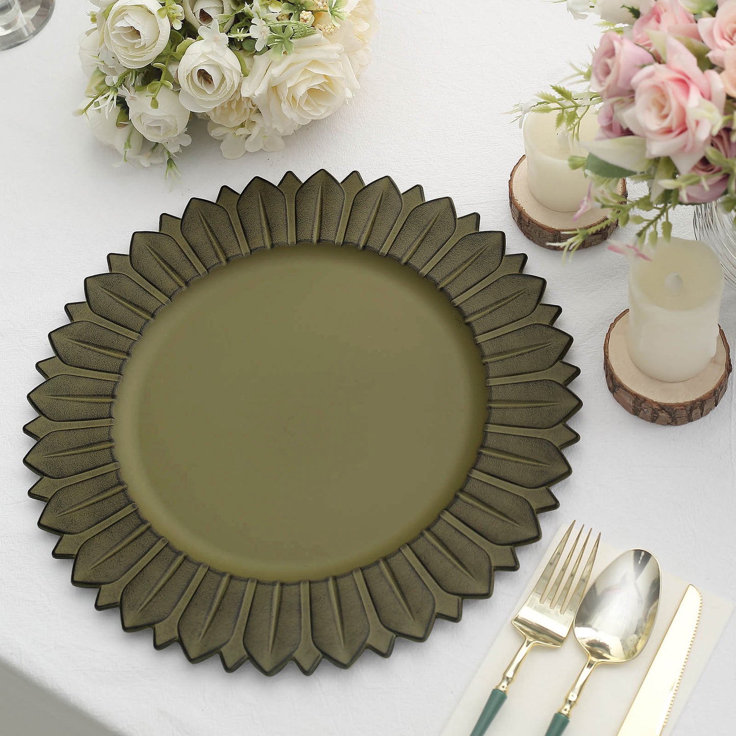 Matte olive green sunflower charger plate on a dining table.