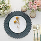 Matte teal sunflower charger plate with floral decor on a dining table.