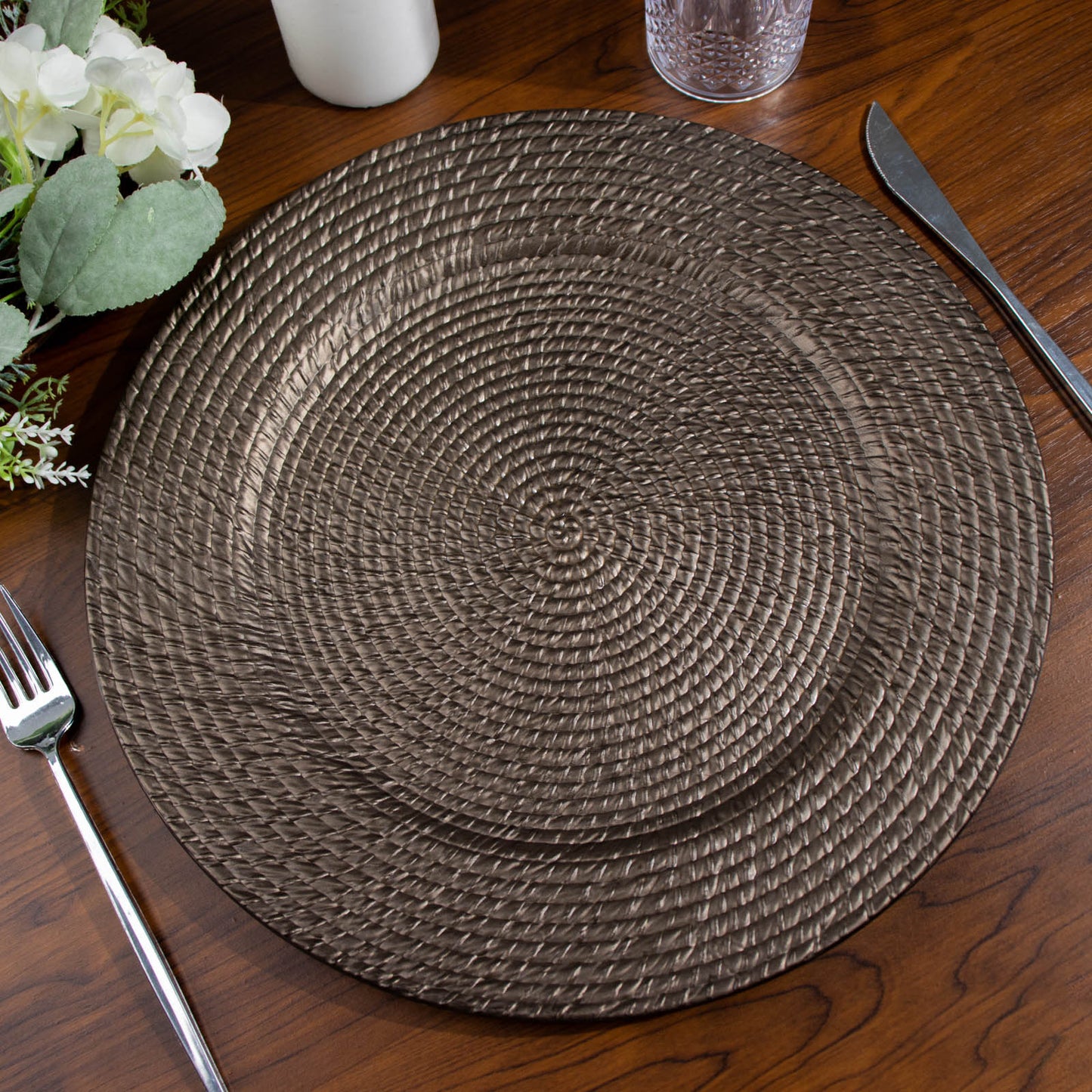 Natural brown rattan-like charger plate, 13" round, perfect for farmhouse table settings.