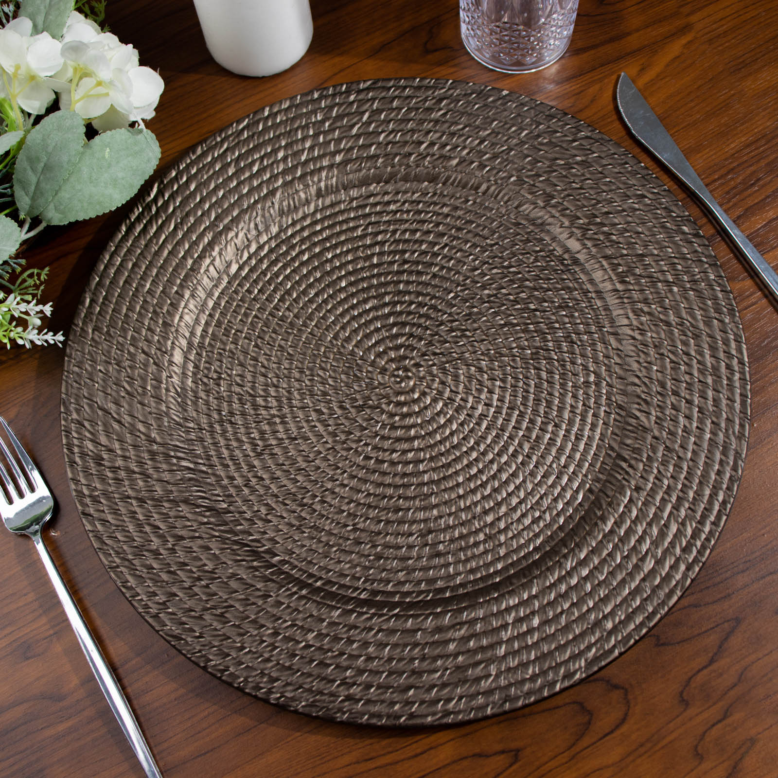 Natural brown rattan-like charger plate, 13" round, perfect for farmhouse table settings.