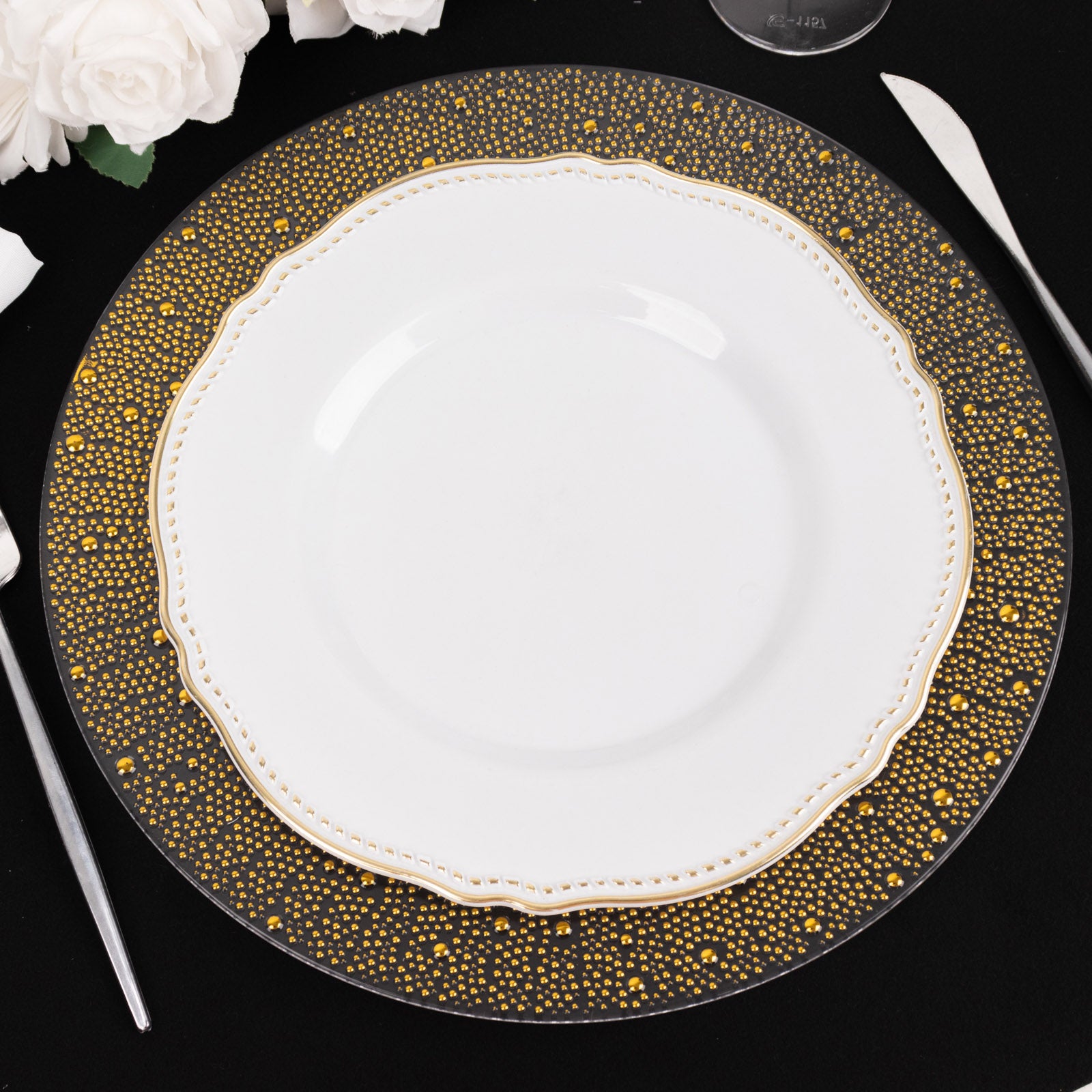 Clear and gold pearl beaded disposable wedding charger plate with dotted rim.