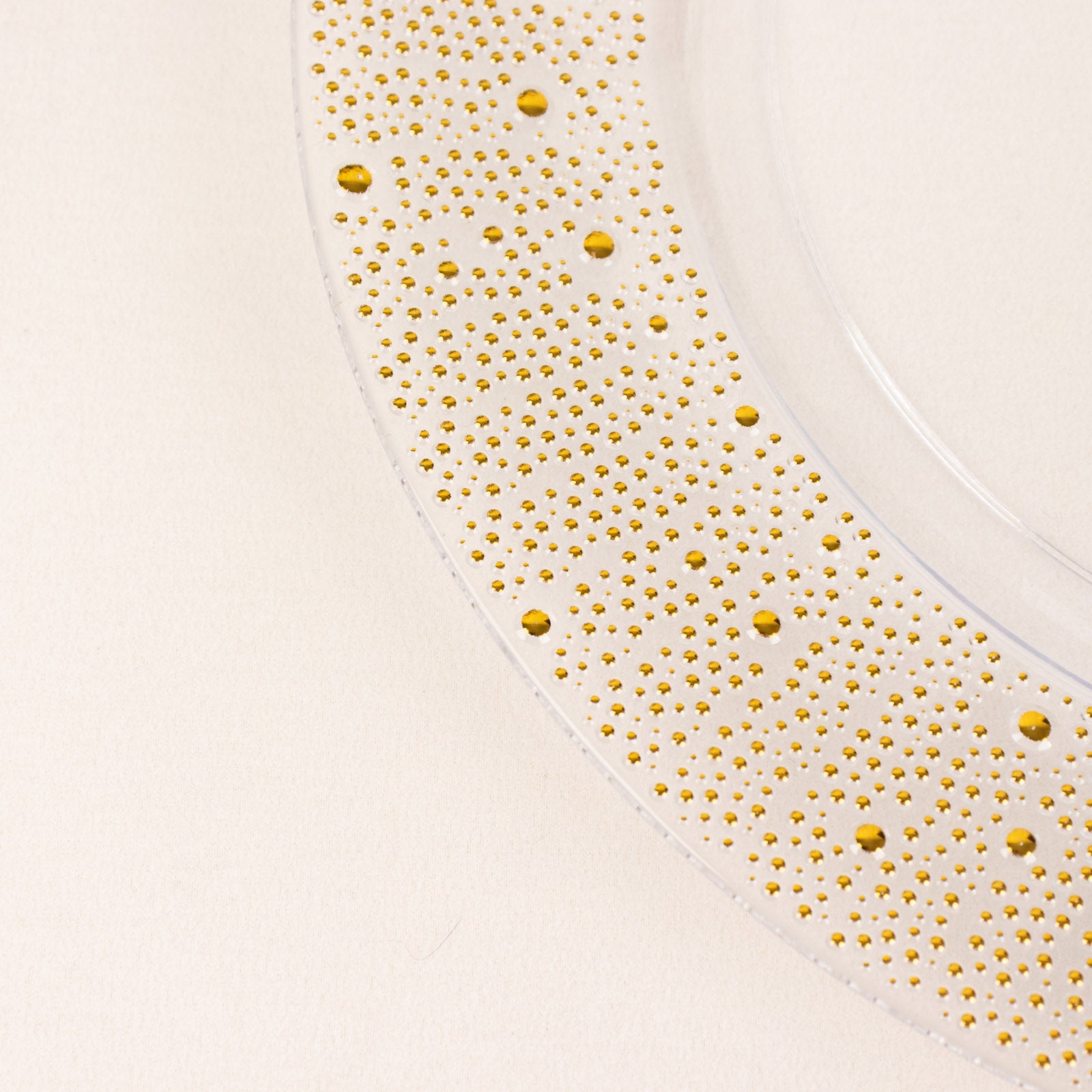 Clear and gold pearl beaded disposable wedding charger plate.