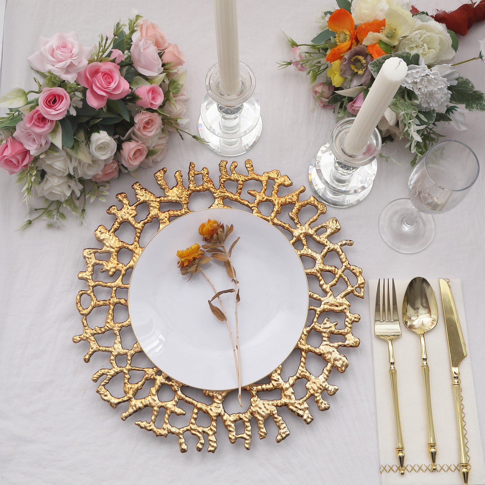 Gold acrylic charger plate with lace design, perfect for elegant table settings.