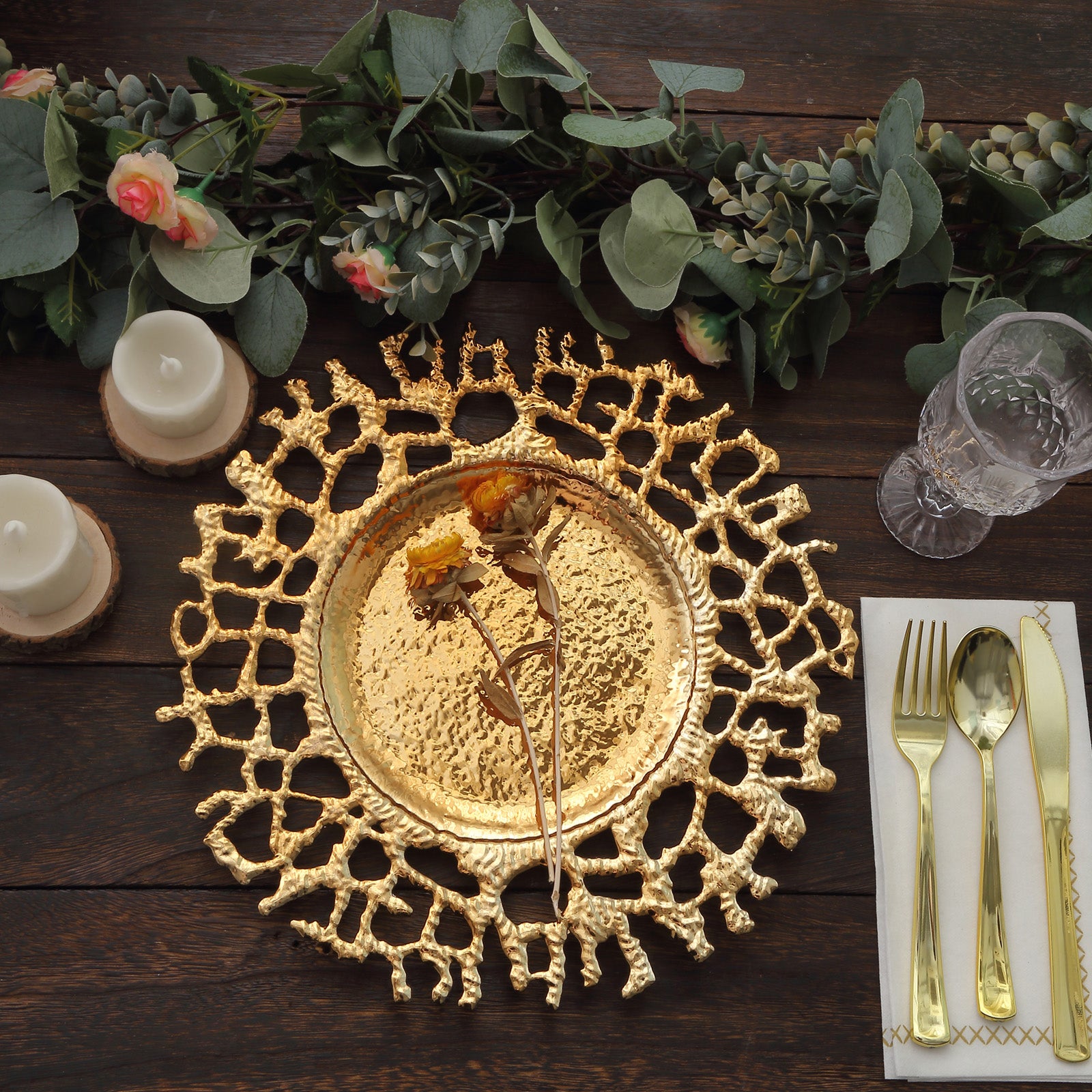 Gold acrylic charger plate with decorative lace design.