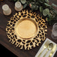 Gold molten branch acrylic charger plate on a rustic table setting.
