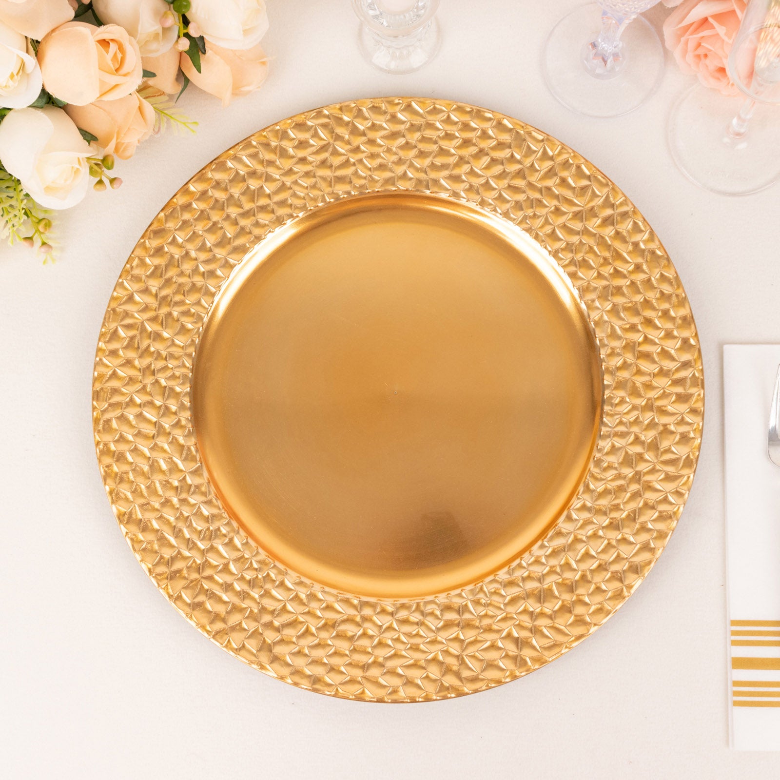 Metallic gold acrylic dinner serving plate with hammered rim.