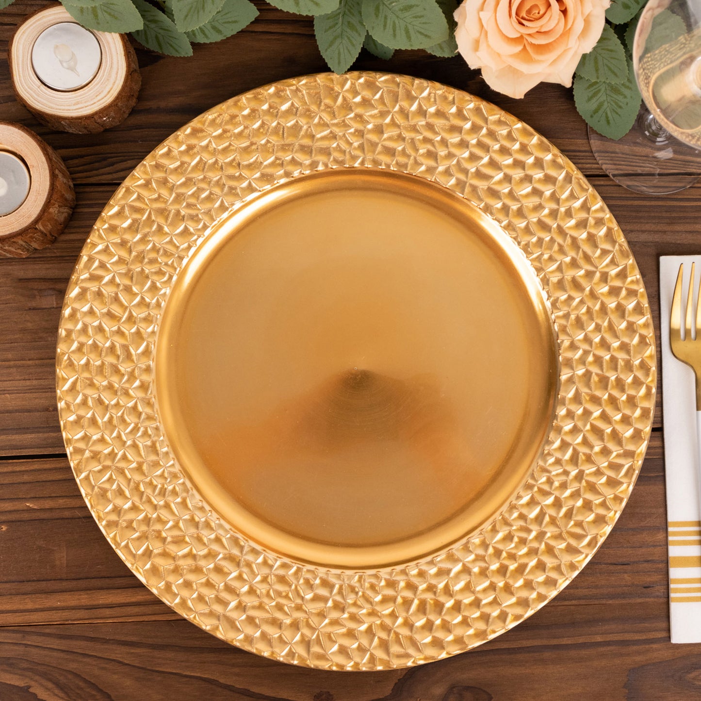 Metallic gold acrylic dinner serving plate with hammered rim.