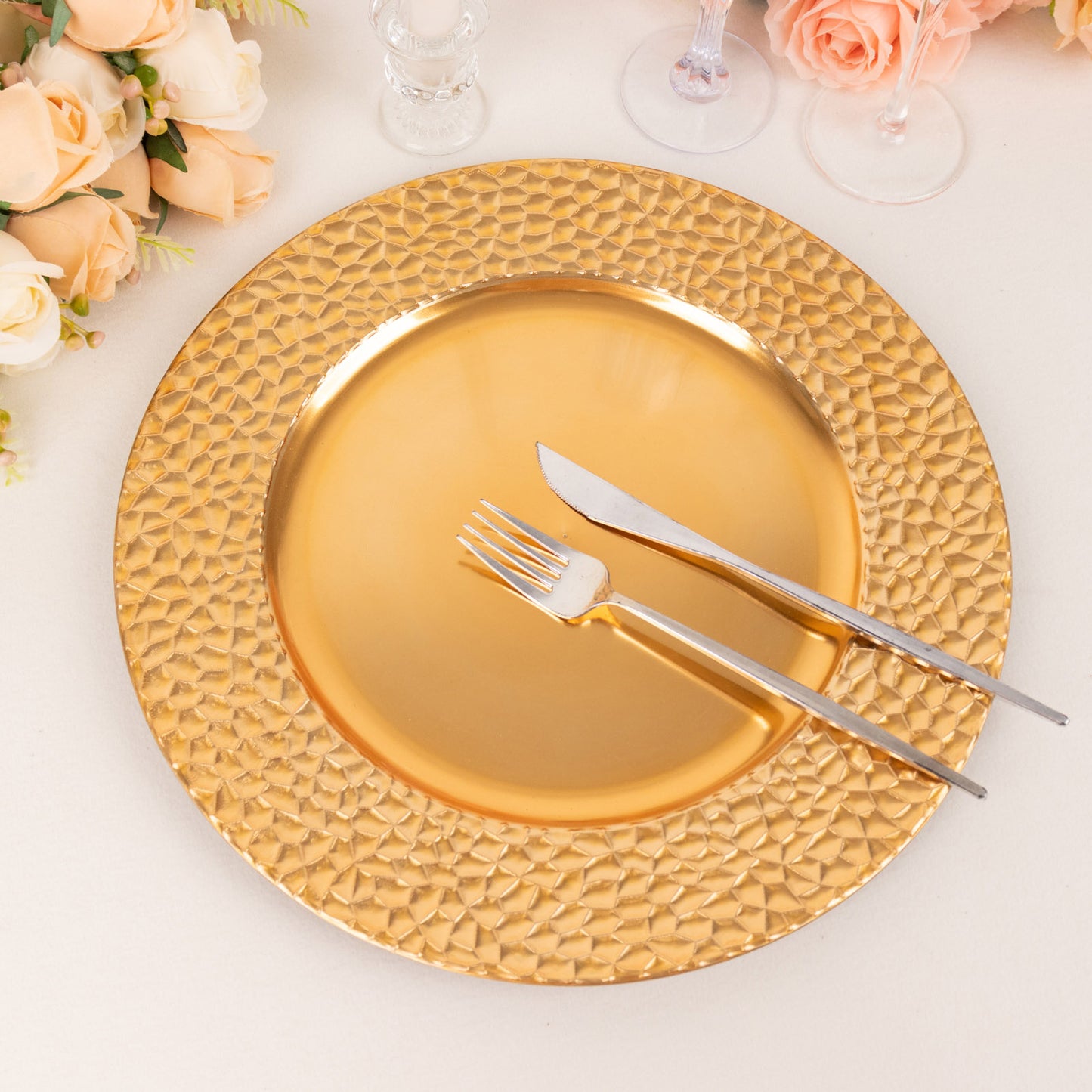 Metallic gold acrylic dinner serving plate with hammered rim, 13" round.
