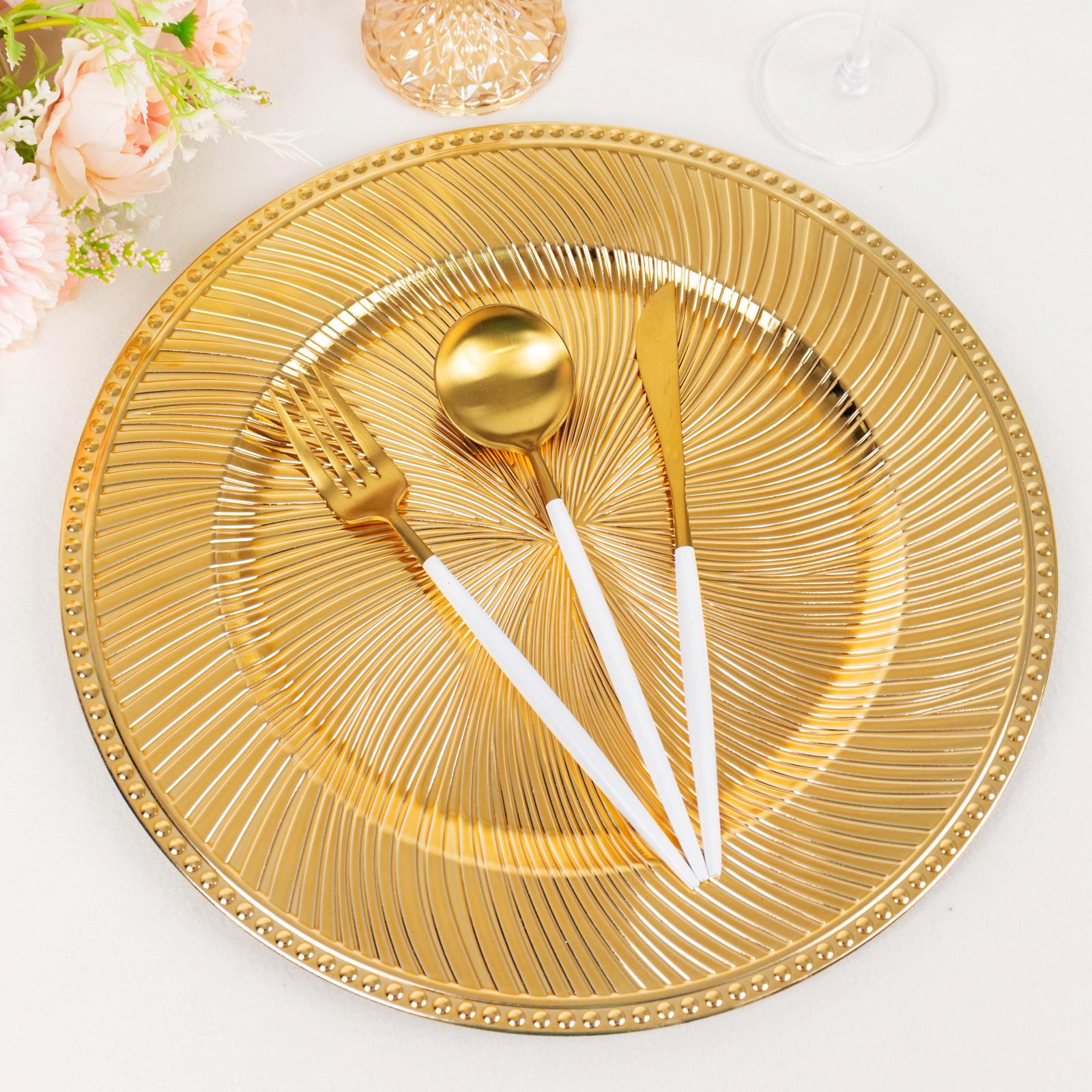 Metallic gold swirl pattern round acrylic charger plate with beaded rim.