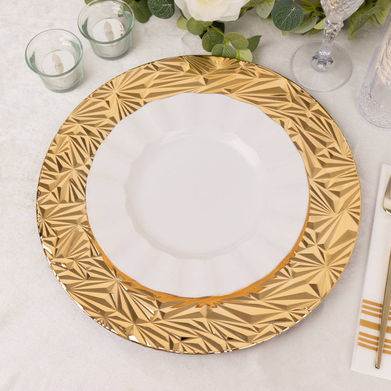 Metallic gold rock cut acrylic charger plates with decorative design.