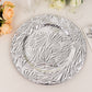 Metallic silver decorative charger plate with rock cut design.