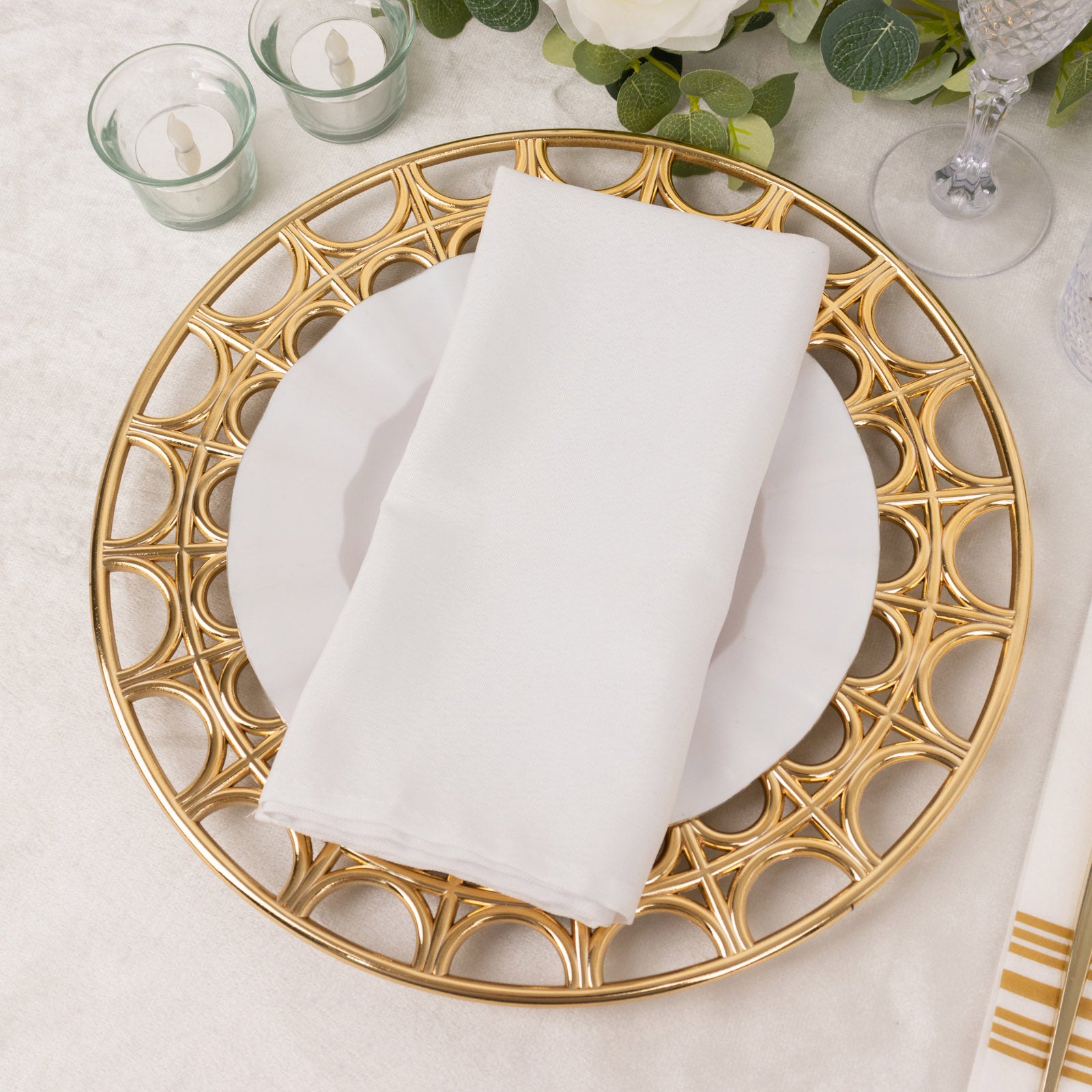 Metallic gold acrylic charger plate with hollow out rim, 13" round.