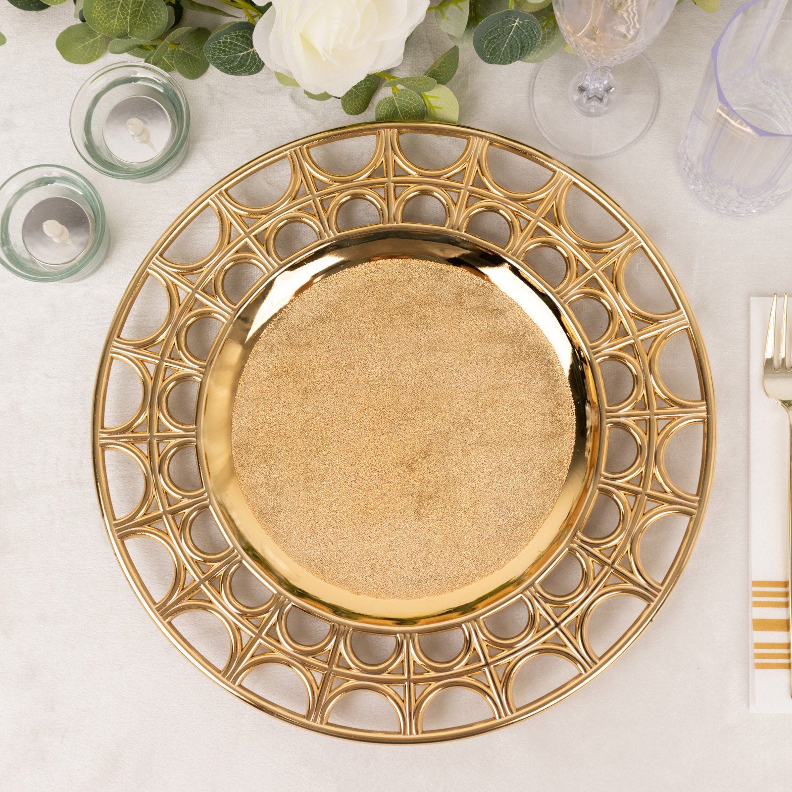 Metallic gold acrylic charger plate with semi-circle hollow rim, 13" round.
