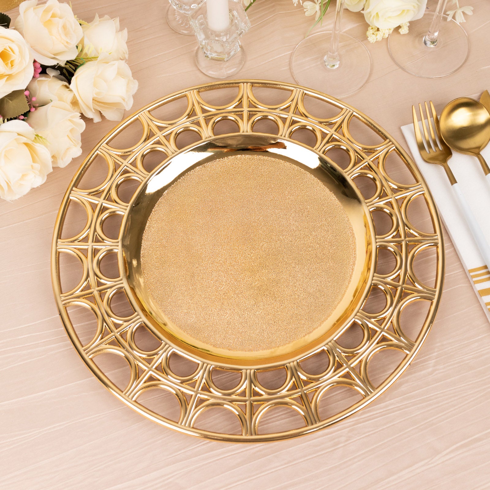 Metallic gold decorative charger plate with semi-circle hollow out rim.