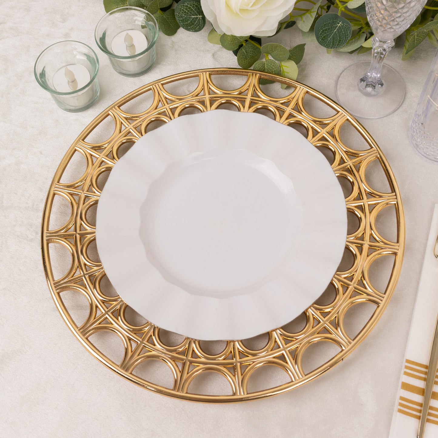 Metallic gold acrylic charger plate with hollow rim, 13" round decorative design.