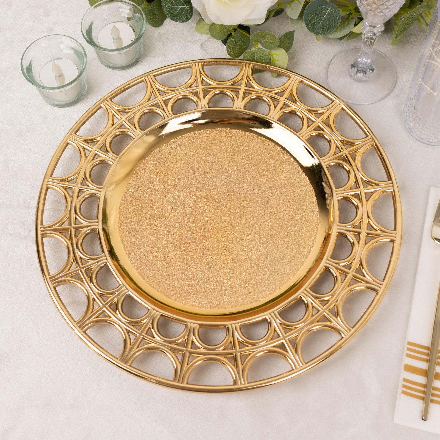 Gold metallic charger plate with hollow out rim, perfect for decorative dining.
