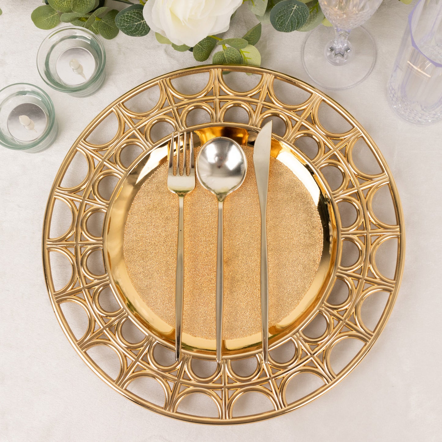 Metallic gold acrylic charger plate with semi-circle hollow rim.