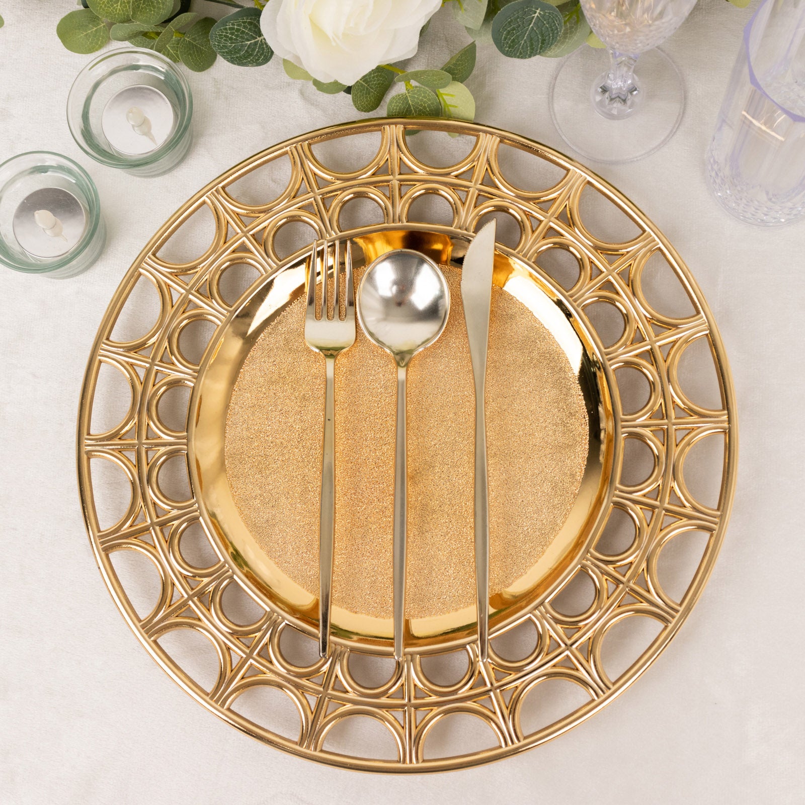 Metallic gold acrylic charger plate with semi-circle hollow rim.