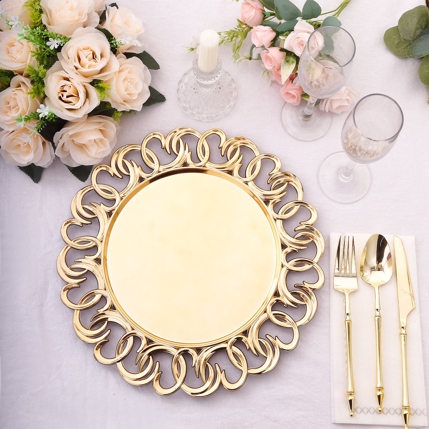Gold disposable charger plate with entwined swirl rim, perfect for elegant dining.