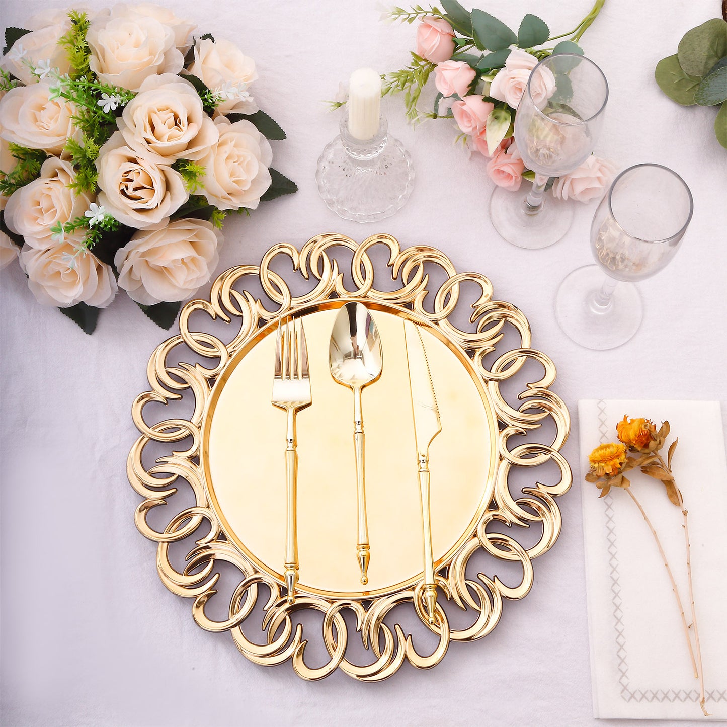 Gold disposable charger plates with entwined swirl rim, 13" round.