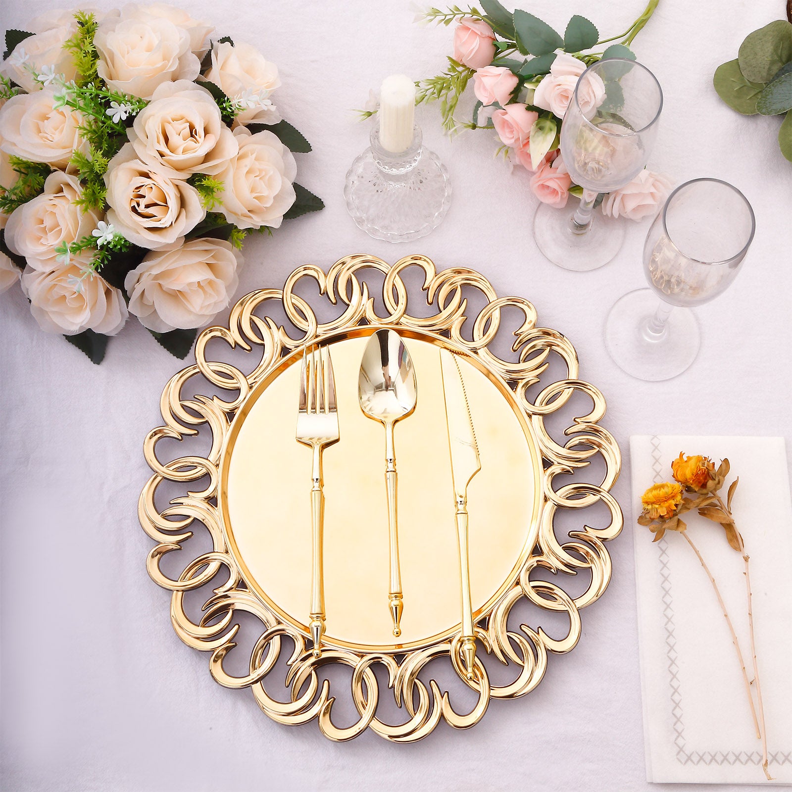 Gold disposable charger plates with entwined swirl rim, 13" round.