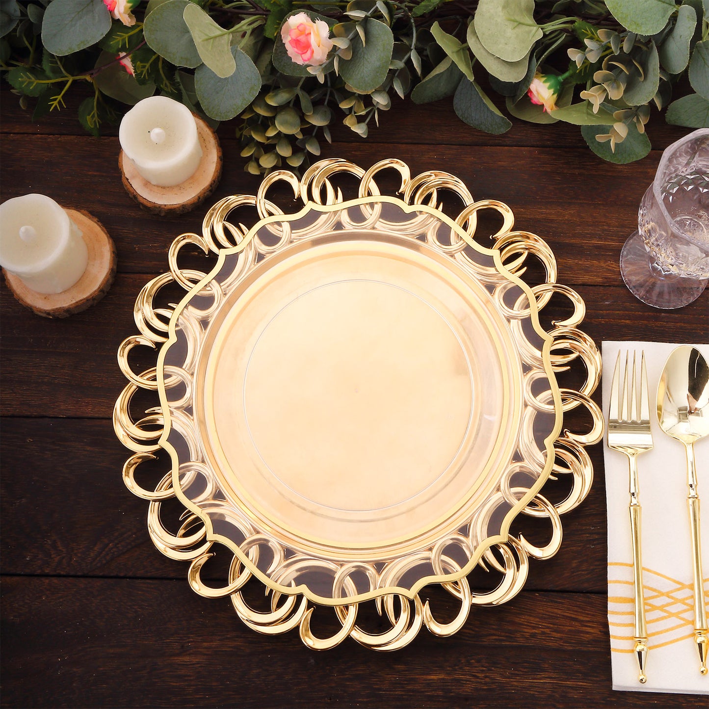 Gold disposable charger plate with entwined swirl rim on a rustic table setting.