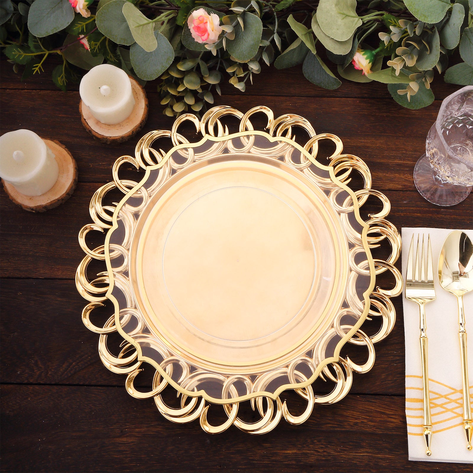 Gold disposable charger plate with entwined swirl rim on a rustic table setting.