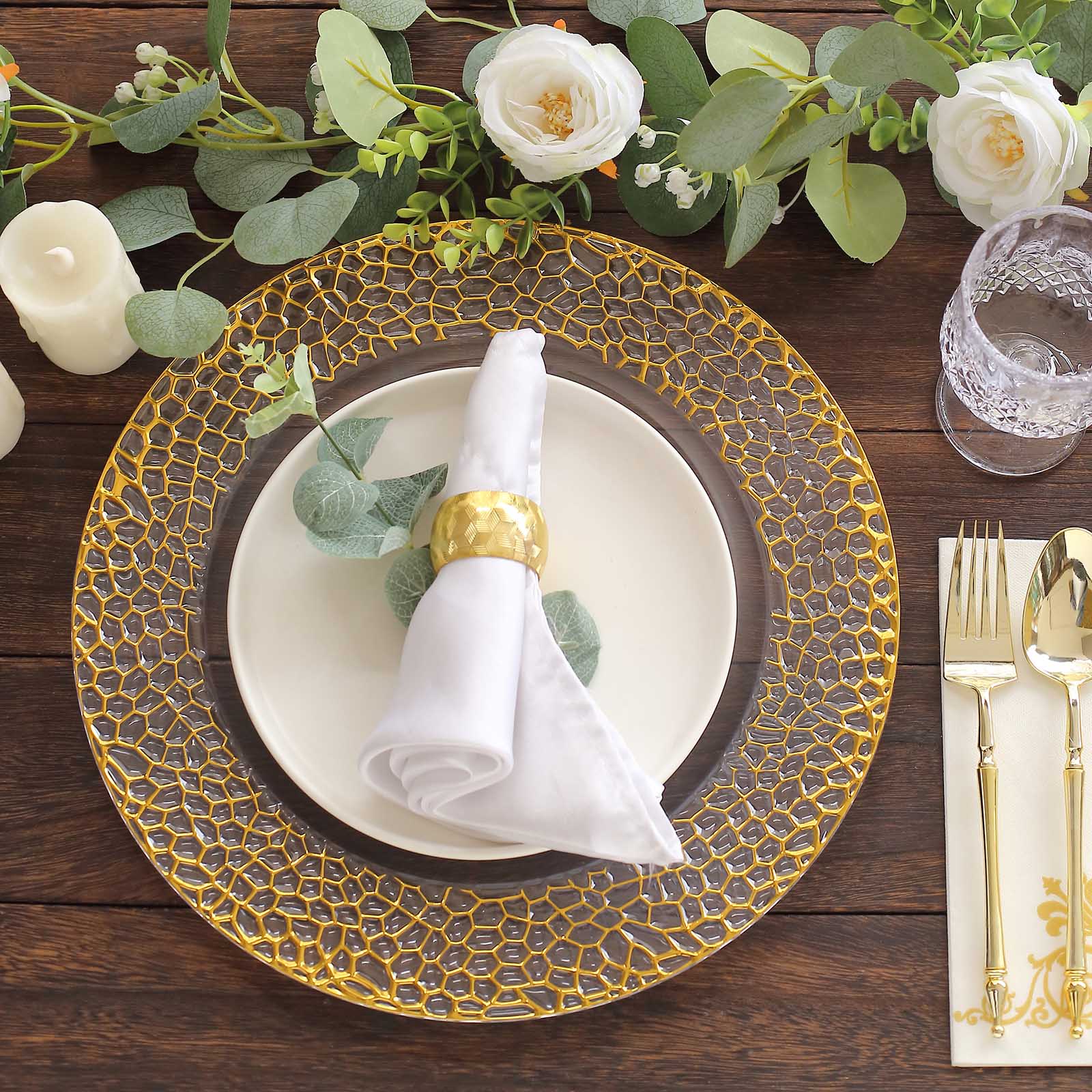 Clear acrylic round charger plate with gold hammered rim, decorative serving dish.