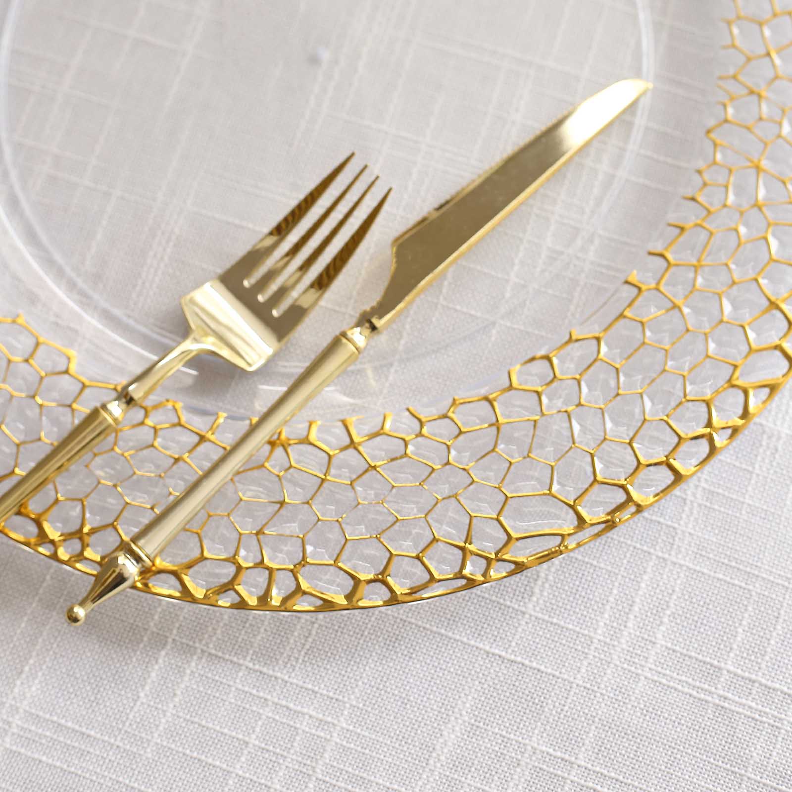 Clear acrylic charger plate with gold hammered rim.