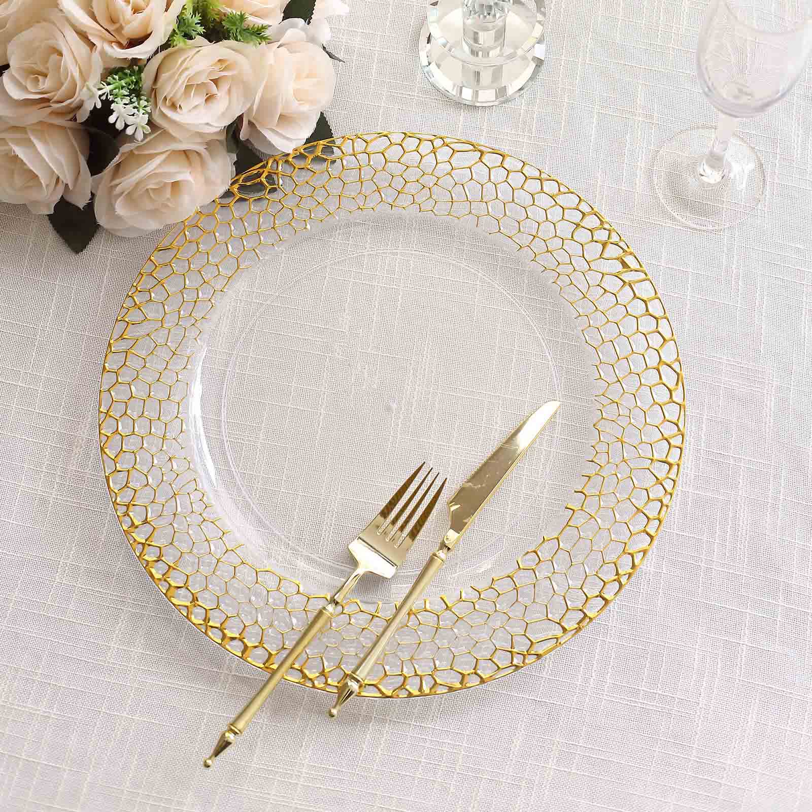 Clear acrylic charger plate with gold hammered rim, elegant dining setting.