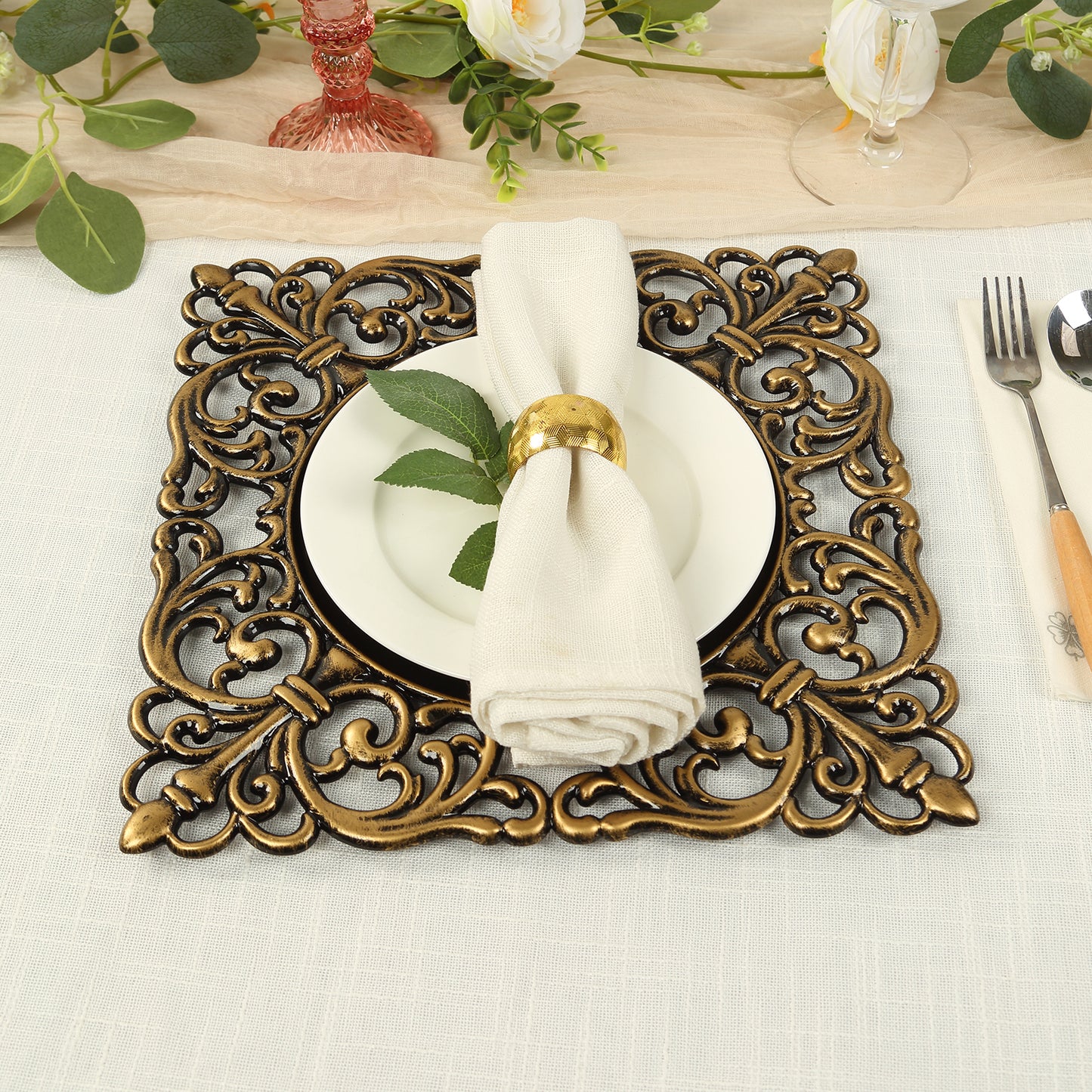 Black square acrylic charger plate with antique gold lace border.
